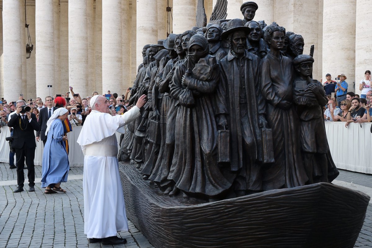 Pope Francis unveils a sculpture commemorating migrants and refugees entitled "Angels Unawares" by Canadian artist Timothy Schmaltz on September 29, 2019 at St. Peter's Square.