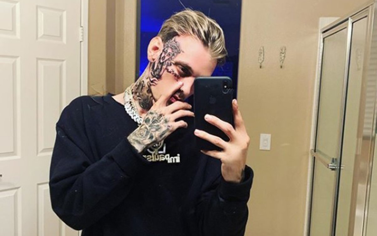 Aaron Carter debuts his face tattoo on Instagram.
