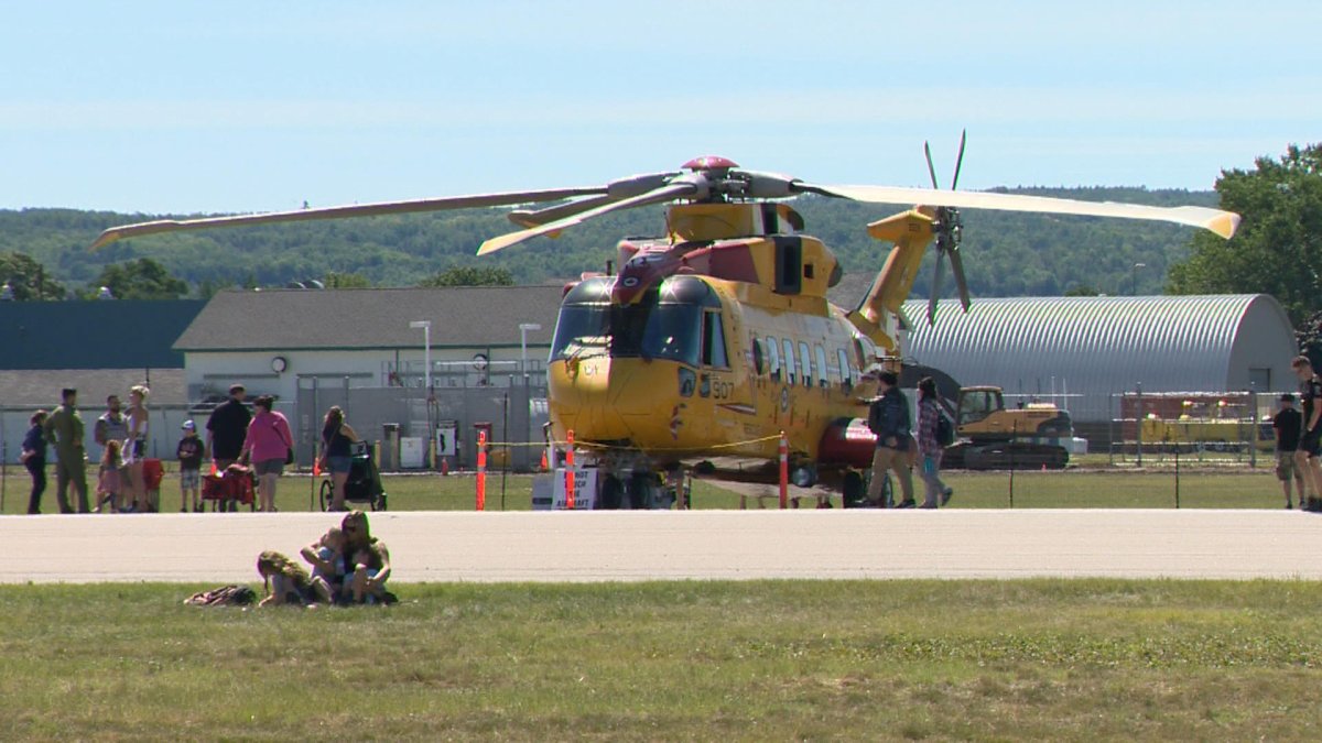 Fans check out a helicopter at the 2019 Air Show Atlantic.