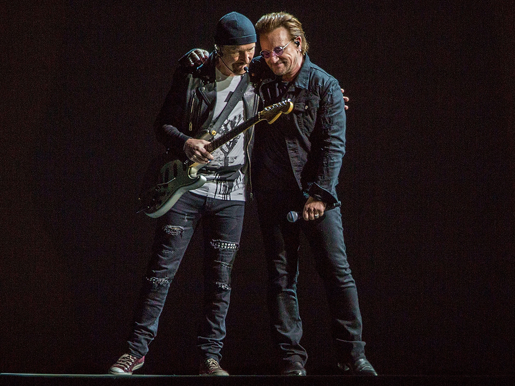 The Edge (L) and Bono of U2 perform on stage on the final night of 'U2: The Joshua Tree tour' at SDCCU Stadium on Sept. 22, 2017 in San Diego, Calif.