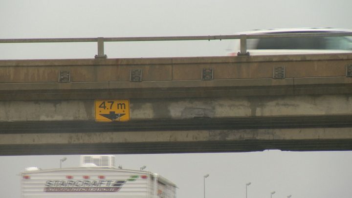 RCMP are investigating damage on the Albert Street overpass and are advising drivers to use caution until it gets fixed.
