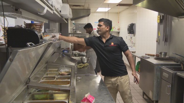 Deepak Bodola  is an Indian immigrant who now owns an Indian restaurant in Brooks, Alberta .