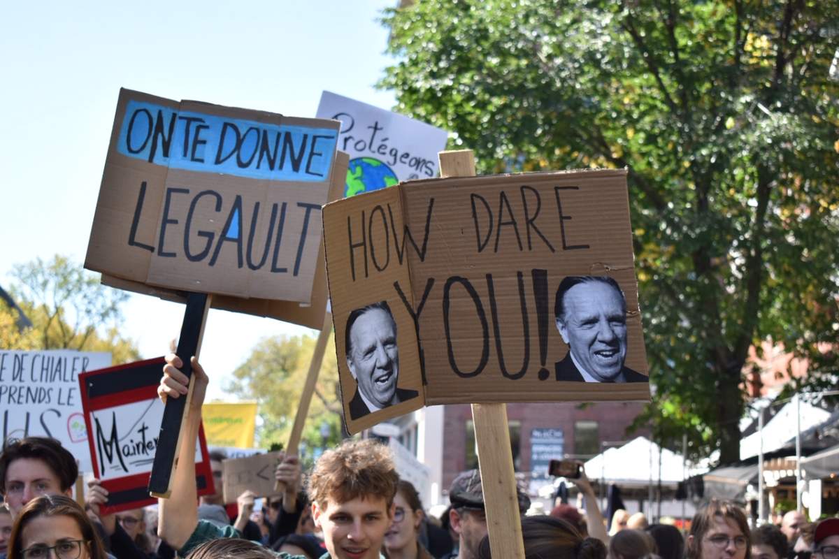 Signs at the climate march in Quebec City on Sept. 27, 2019.