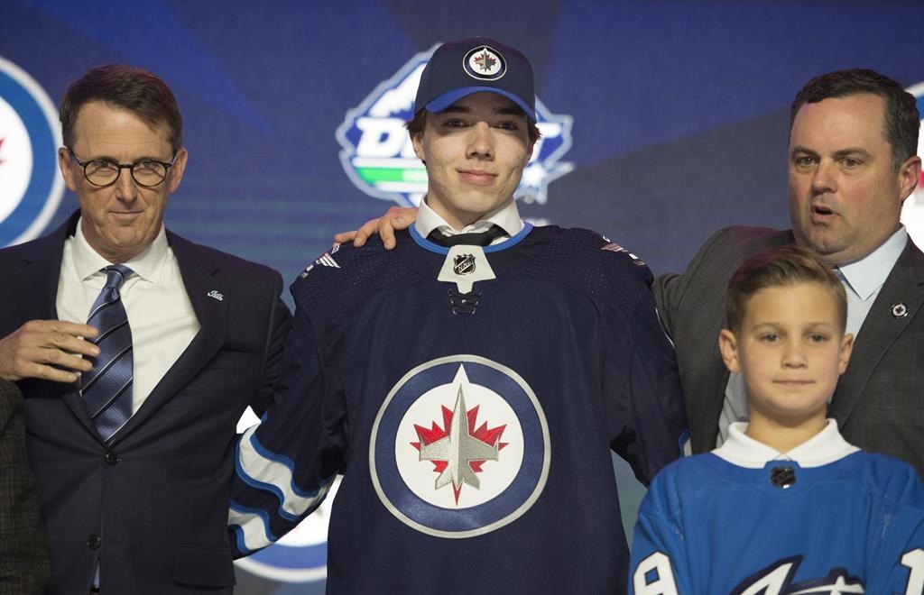 Winnipeg Jets select Ville Heinola during the first round NHL draft at Rogers Arena in Vancouver, Friday, June, 21, 2019.