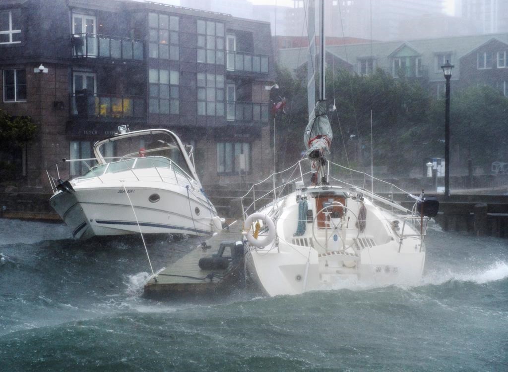 Pleasure boats take a beating along the waterfront in Halifax as hurricane Dorian approaches on Saturday, Sept. 7, 2019.