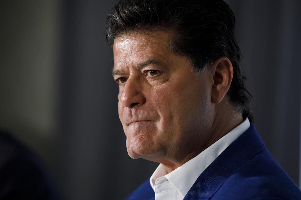 Unifor president Jerry Dias attends a press conference announcing GM's investment in the Oshawa assembly plant, in Toronto, Wednesday, May 8, 2019. Dias says the massive autoworker strike that hit General Motors in the U.S. today could migrate to Canada next year if trust is not restored. THE CANADIAN PRESS/Cole Burston.