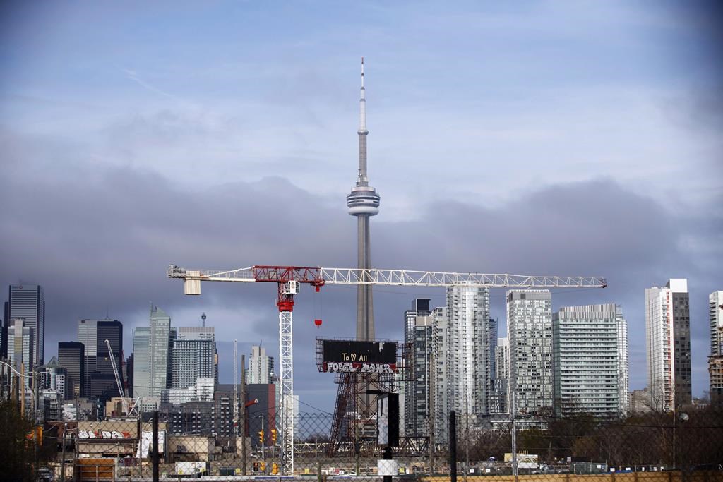 The CN Tower can be seen in the Toronto skyline in Toronto, Ontario. THE CANADIAN PRESS/Cole Burston