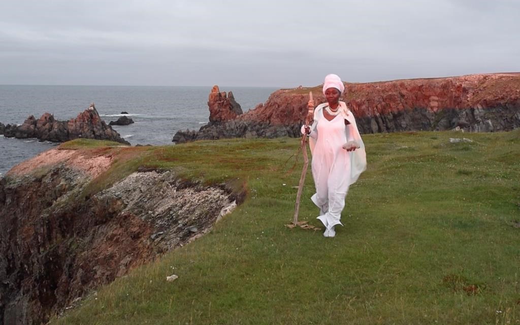 Artist Camille Turner's Afronautic Research Lab, now installed at the Bonavista Biennale in Bonavista, N.L., is shining a light on a dark corner of Newfoundland's history -- slave ships that were built on the island during the 1700s. Turner is seen in an undated still image taken from a video installation, in Bonavista, Newfoundland and Labrador.