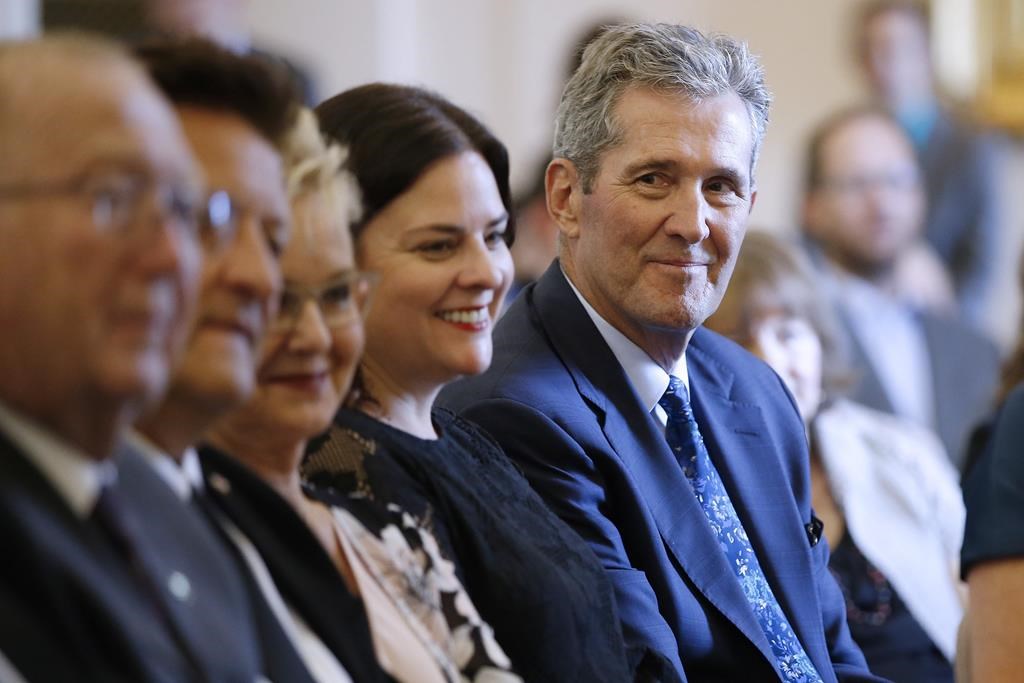 Premier Brian Pallister looks at some of his new provincial MLAs. Manitoba politicians are returning to the legislature for the first time since the provincial election three weeks ago.
