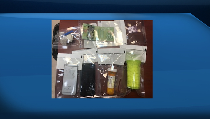 Drugs, cash and other items reportedly seized by police during a traffic stop on Tuesday.