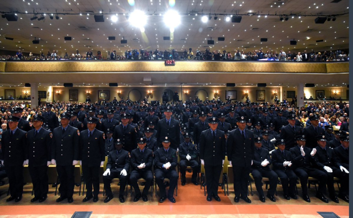 A group of 13 firefighters who lost their fathers on 9/11 graduated on Tuesday.