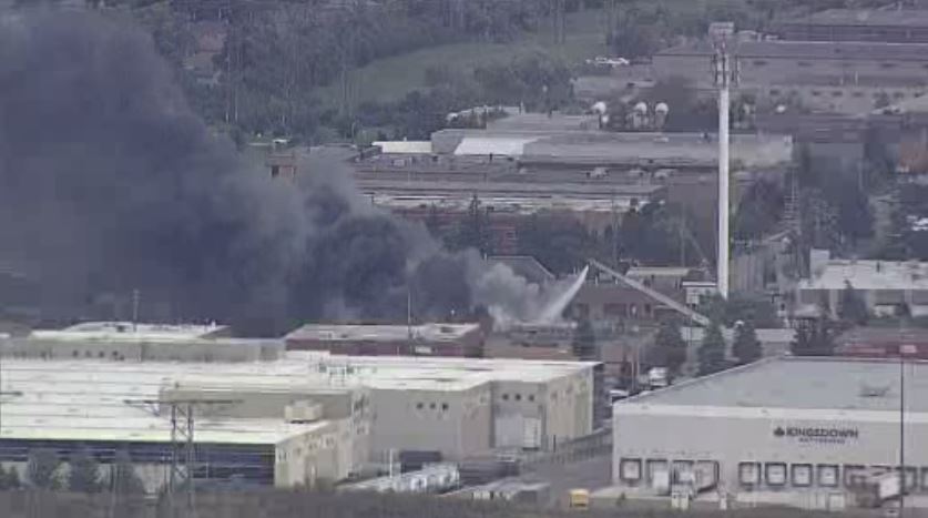 The fire at the Steeles Avenue West property forced train traffic on the CN Rail line to stop.