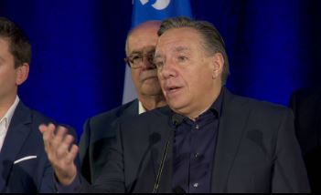 When the new parliamentary session begins on next week, Premier François Legault promises the 75 CAQ MNA's will be busy, especially some women cabinet ministers. He spoke to reporters in  Rivière-du-Loup Friday, Sept. 13, 2019.