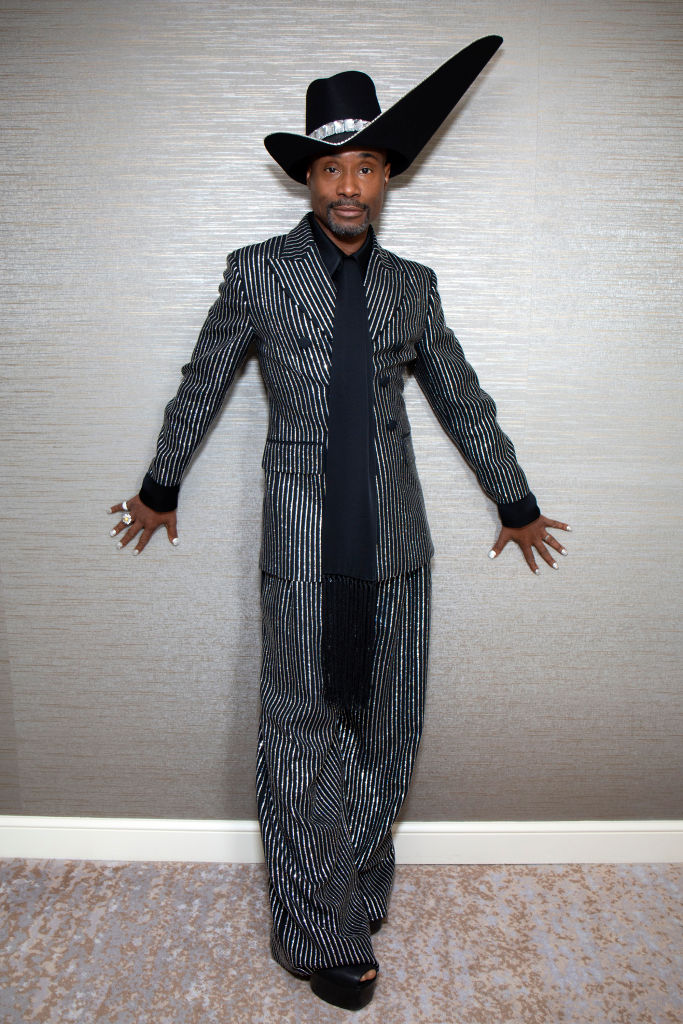 Billy Porter wore a Michael Kors suit and hat by Stephen Jones millinery.