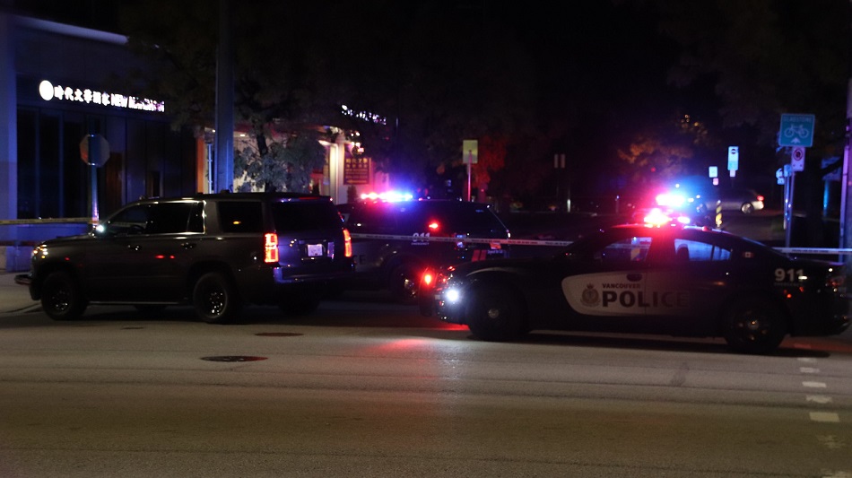 Vancouver police outside an East Vancouver restaurant where a person was injured in a targeted shooting early on Sept. 29, 2019.