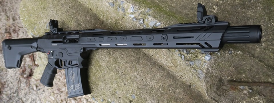 The photo features a similar shotgun. 