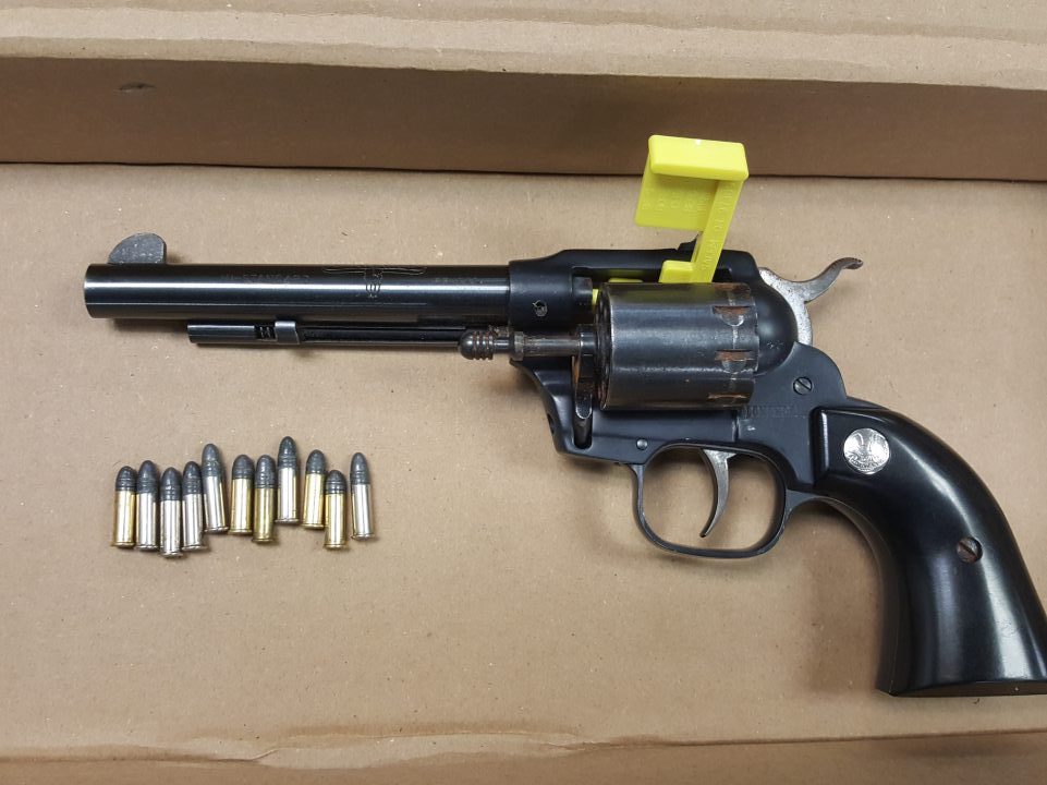 Police allege this gun was recovered from the vehicle after the chase.