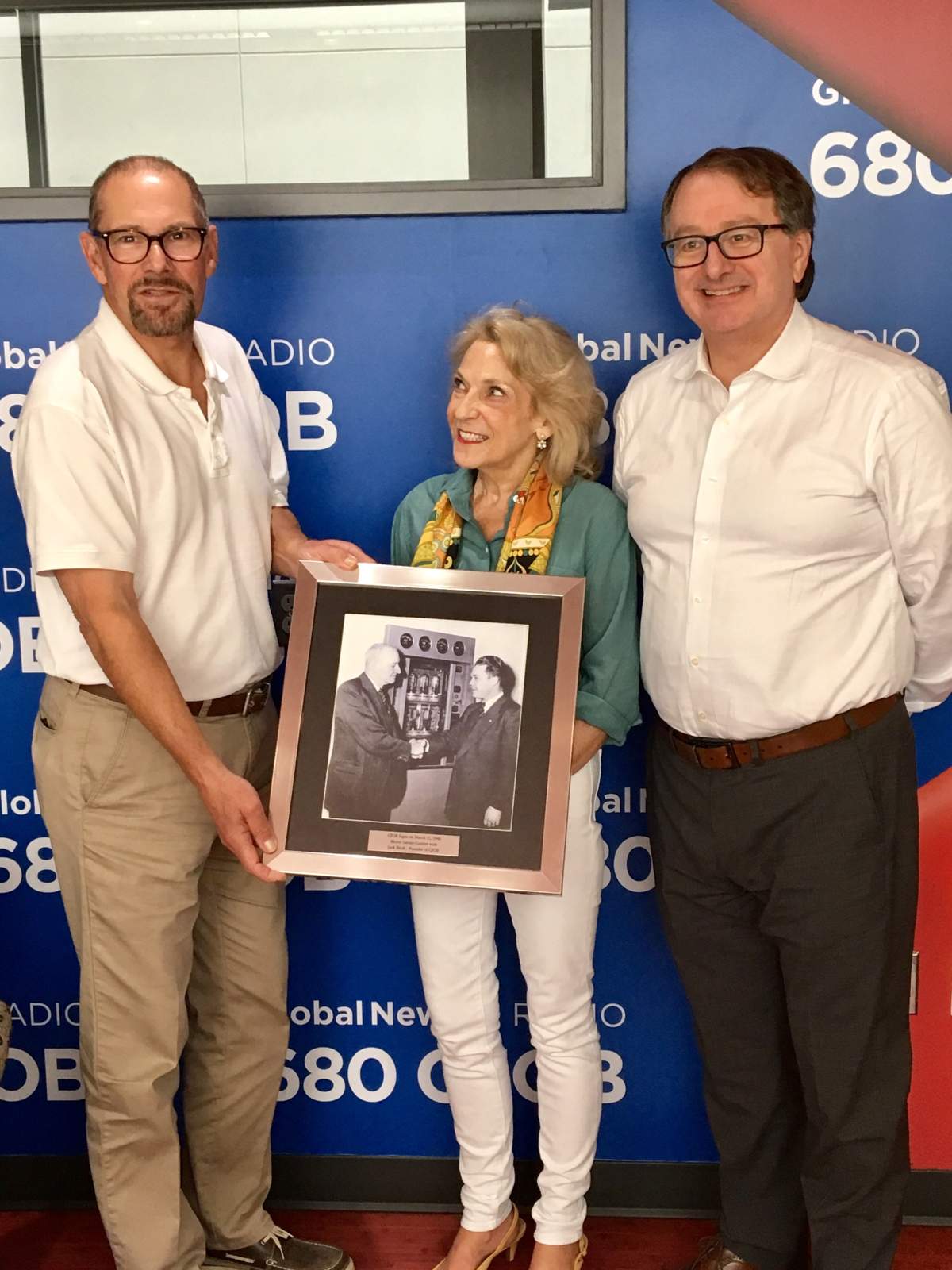 Barbara Berg, daughter of 680 CJOB founder Jack Blick, with longtime on-air personalities Geoff Currier and Richard Cloutier.