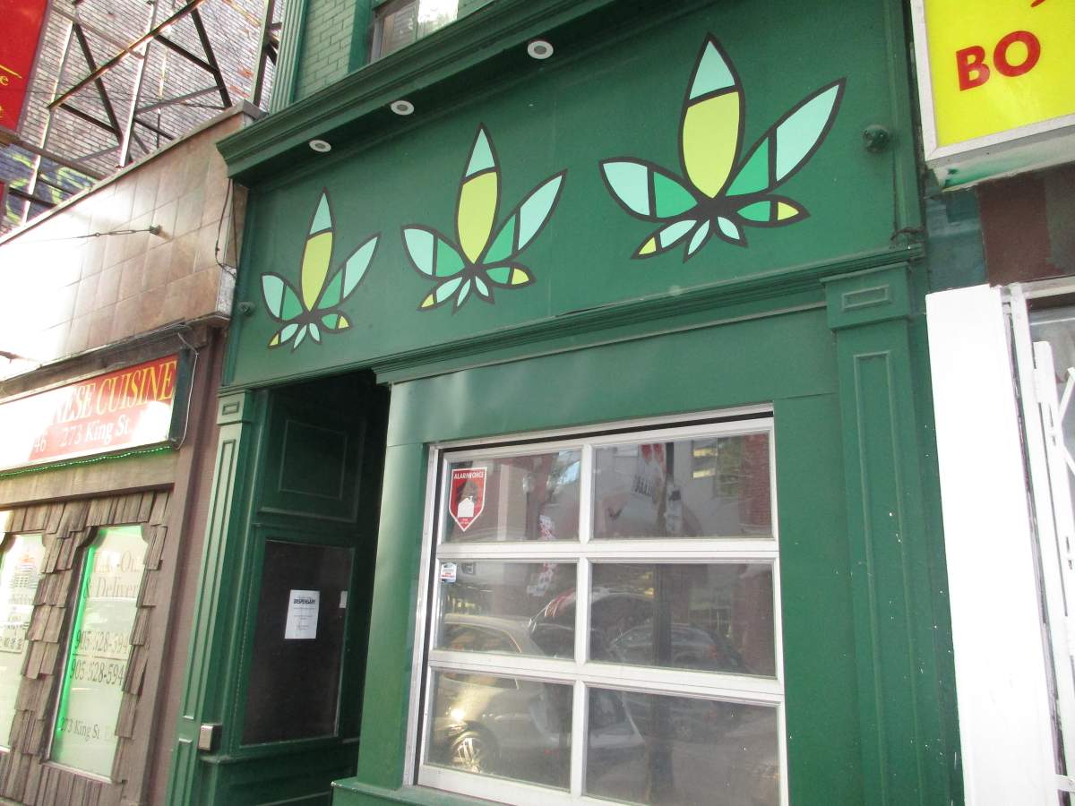 Hamilton Police say a 19-year-old is facing multiple charges after allegedly firing shots in a Cannabis Culture store during a robbery in March 2019.