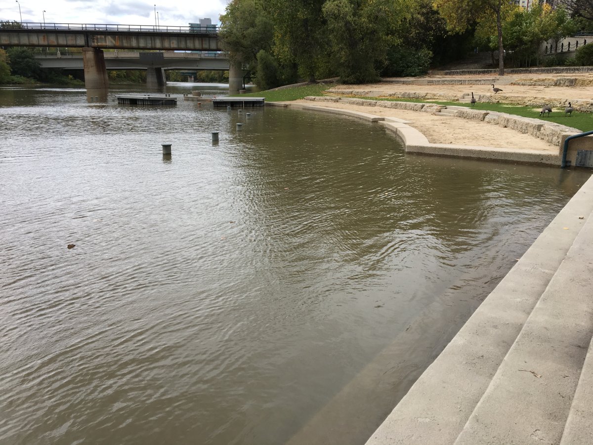 The walkway along the water at The Forks is closed due to high water levels. 
