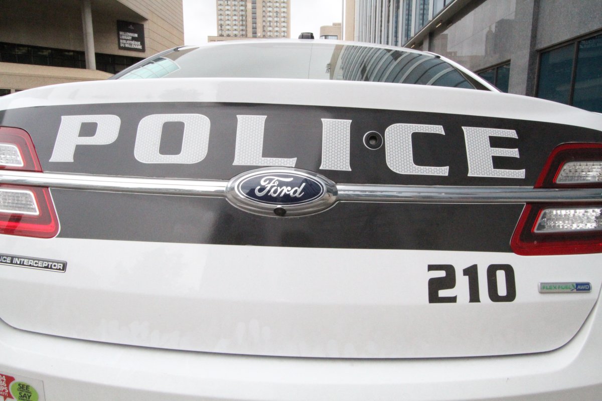 Winnipeg police charged two men after chasing a stolen vehicle through the West End Monday.