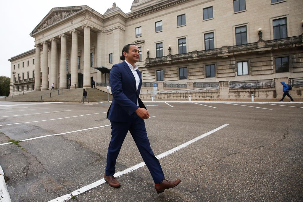 Manitoba NDP leader Wab Kinew leaves after speaking to media on election day outside the Manitoba Legislature in Winnipeg, Tuesday, September 10, 2019. THE CANADIAN PRESS/John Woods.