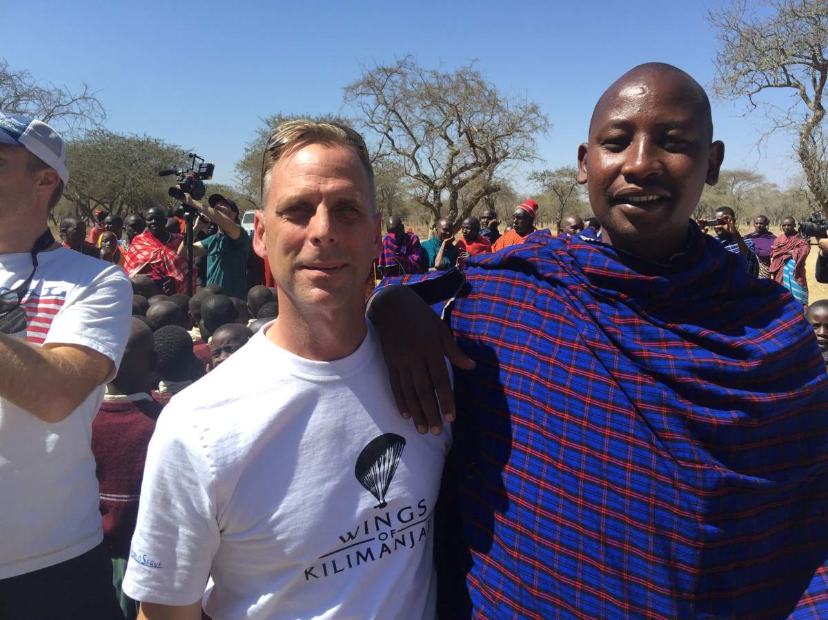Justin Kyllo wears a Wings of Kilimanjaro shirt while posing for pictures in Tanzania in September 2016. Kyllo was killed in a paragliding accident from the summit of Mount Kilimanjaro on Sept. 28, 2019.