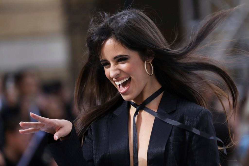 Singer Camila Cabello wears a creation as part of the L’Oreal Ready To Wear Spring-Summer 2020 collection, unveiled during the fashion week, in Paris, Saturday, Sept. 28, 2019. (Photo by Vianney Le Caer/Invision/AP)