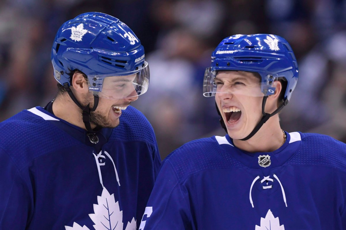 Toronto Maple Leafs right winger Mitch Marner (right) and centre Auston Matthews (left) share a laugh during an NHL game in Toronto on Dec. 20, 2018.