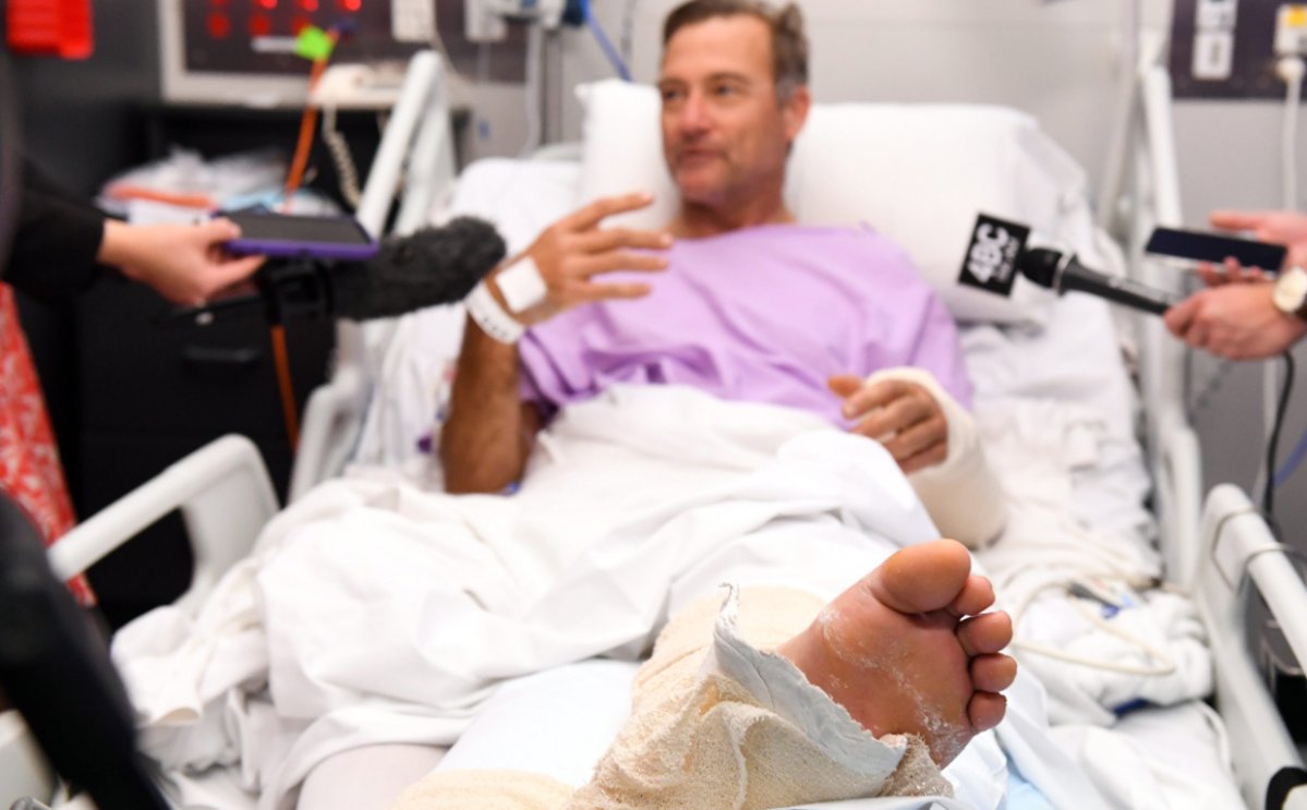 man in hospital broken leg