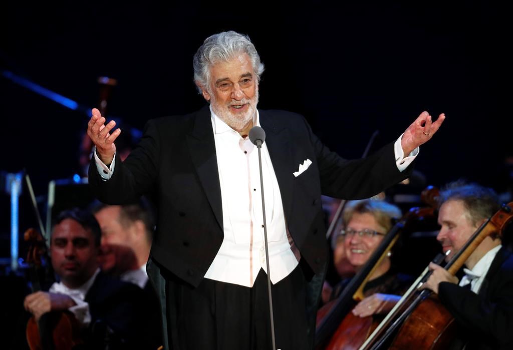 FILE – In this Aug. 28, 2019 file photo, opera star Placido Domingo salutes spectators at the end of a concert in Szeged, Hungary. The Metropolitan Opera confirms, Tuesday, Sept. 24, that Domingo has agreed to withdraw from all future performances at the Met, effective immediately.