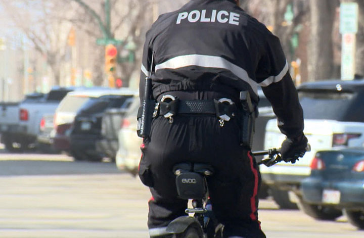 Saskatoon police say a member of its bike unit was struck by a pickup truck early Friday morning.