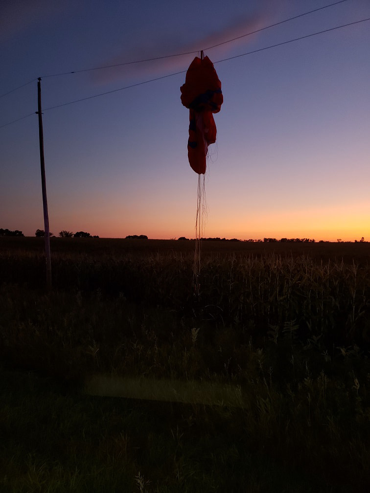 RCMP say a man is safe after his parachute got caught in power lines. 