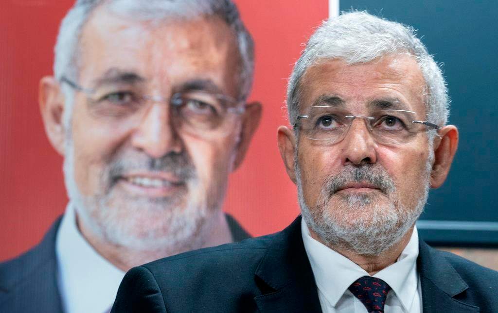 Imam Hassan Guillet, who has been dropped by the Liberal party as a candidate, listens to a question during a news conference in Montreal on Wednesday, September 4, 2019.