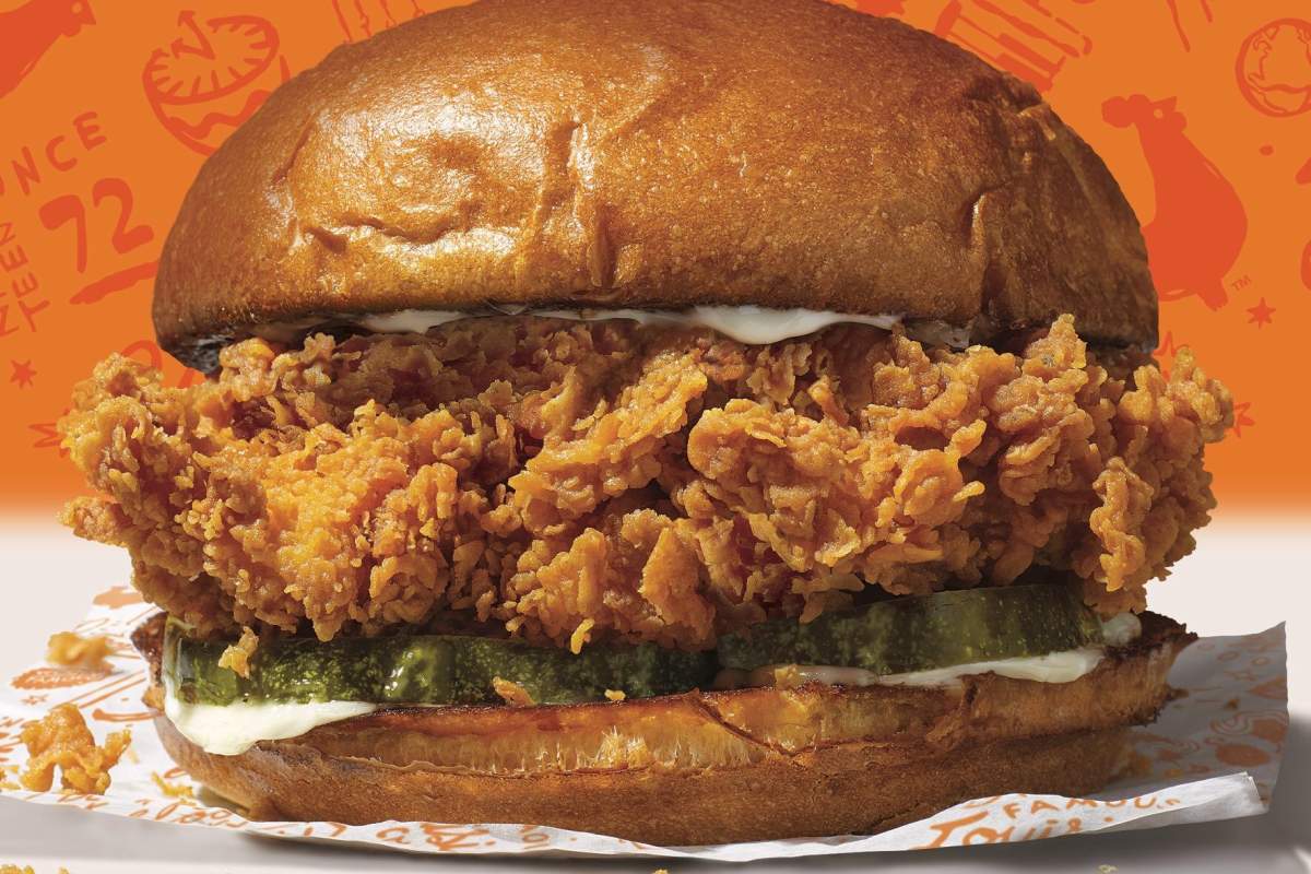 The Popeyes chicken sandwich is shown in this promotional image.