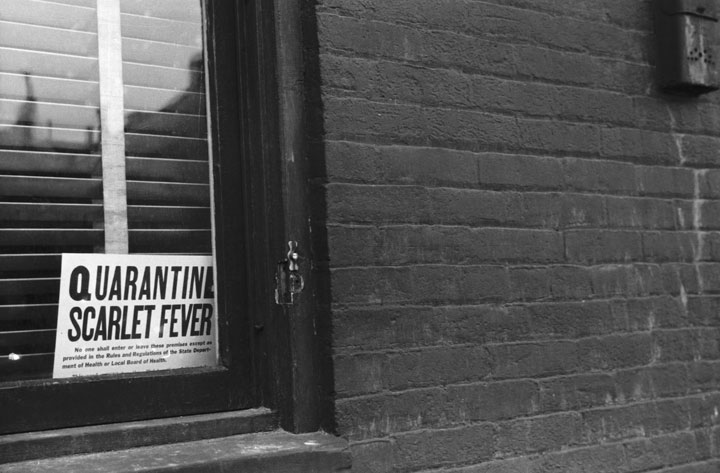 A sign warning of scarlet fever.