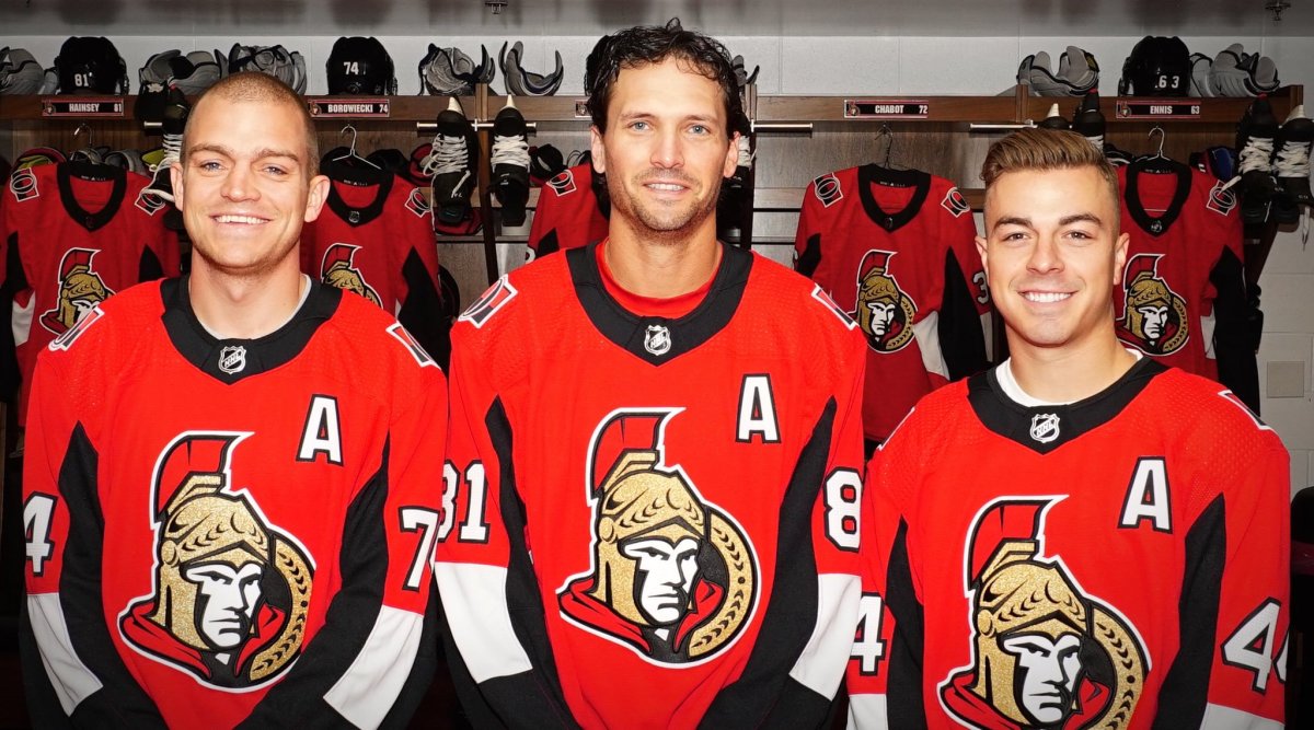 Defencemen Mark Borowiecki (left) and Ron Hainsey (centre) and forward Jean-Gabriel Pageau (right) will serve as alternate captains for the Ottawa Senators this season.