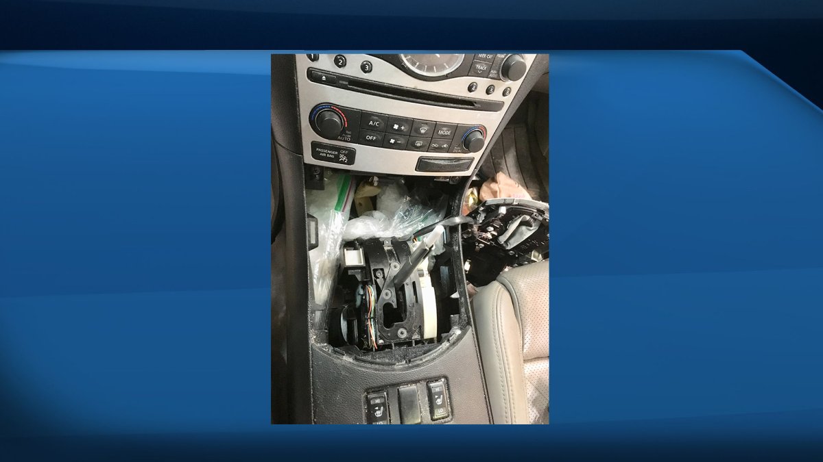 Edmonton police said drugs and a gun were found inside this hidden compartment during searches on Sept. 11, 2019.