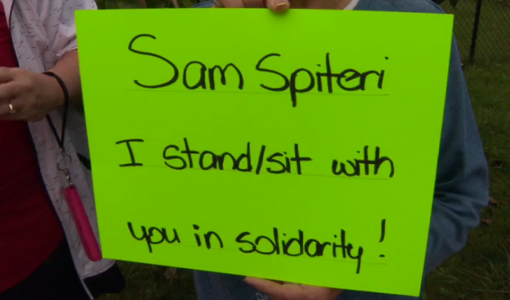 A sign held by a protester in support of Sam Spiteri in Caledon.