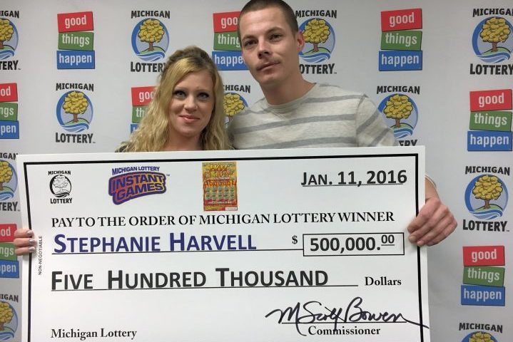 Stephanie Harvell, left, and her husband Mitchell Arnswald are shown after winning the Michigan Lottery on Jan. 11, 2016.