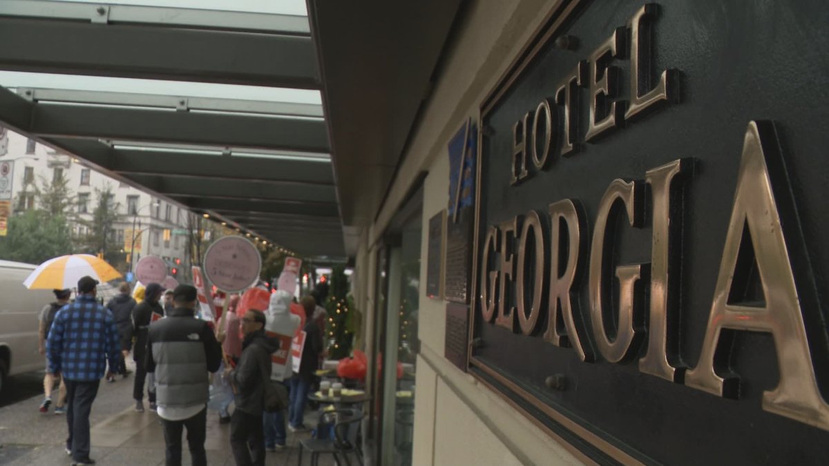 Striking workers outside the Rosewood Hotel Georgia in downtown Vancouver on Sunday, Sept. 22, 2019. 