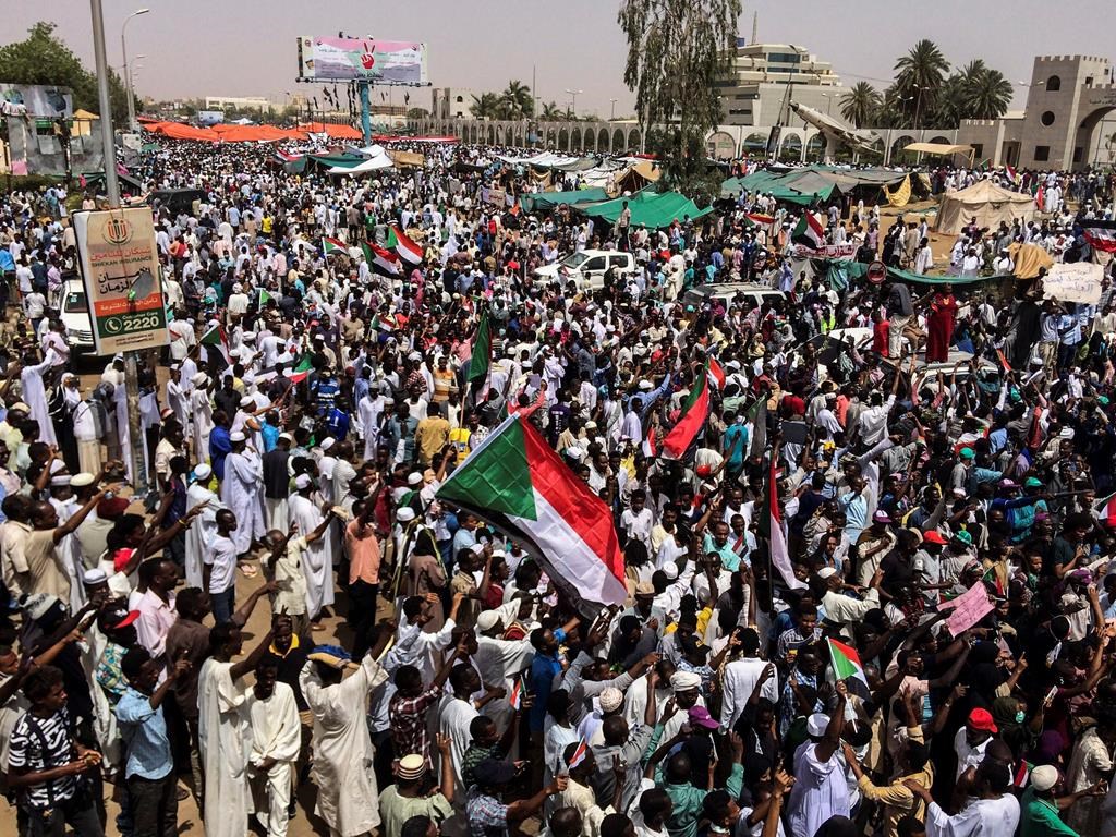 In this April 12, 2019 file photo, demonstrators rally in Sudan's capital, Khartoum.