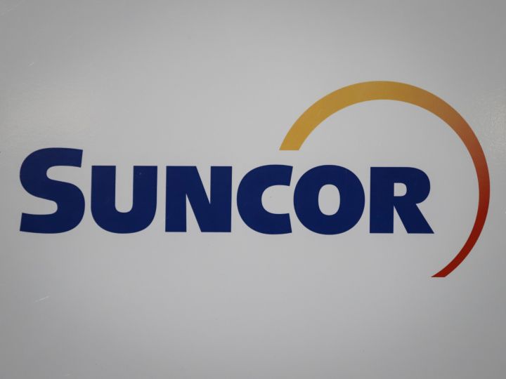 A Suncor logo is shown at the company's annual meeting in Calgary, Thursday, May 2, 2019. 