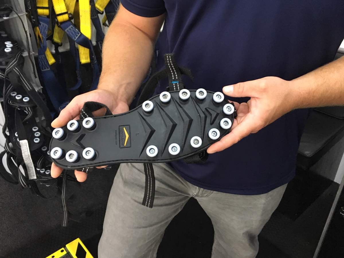 Nova Scotia Power says students will wear these shoe sliders as they attempt to walk along a glass floor with various obstacles.