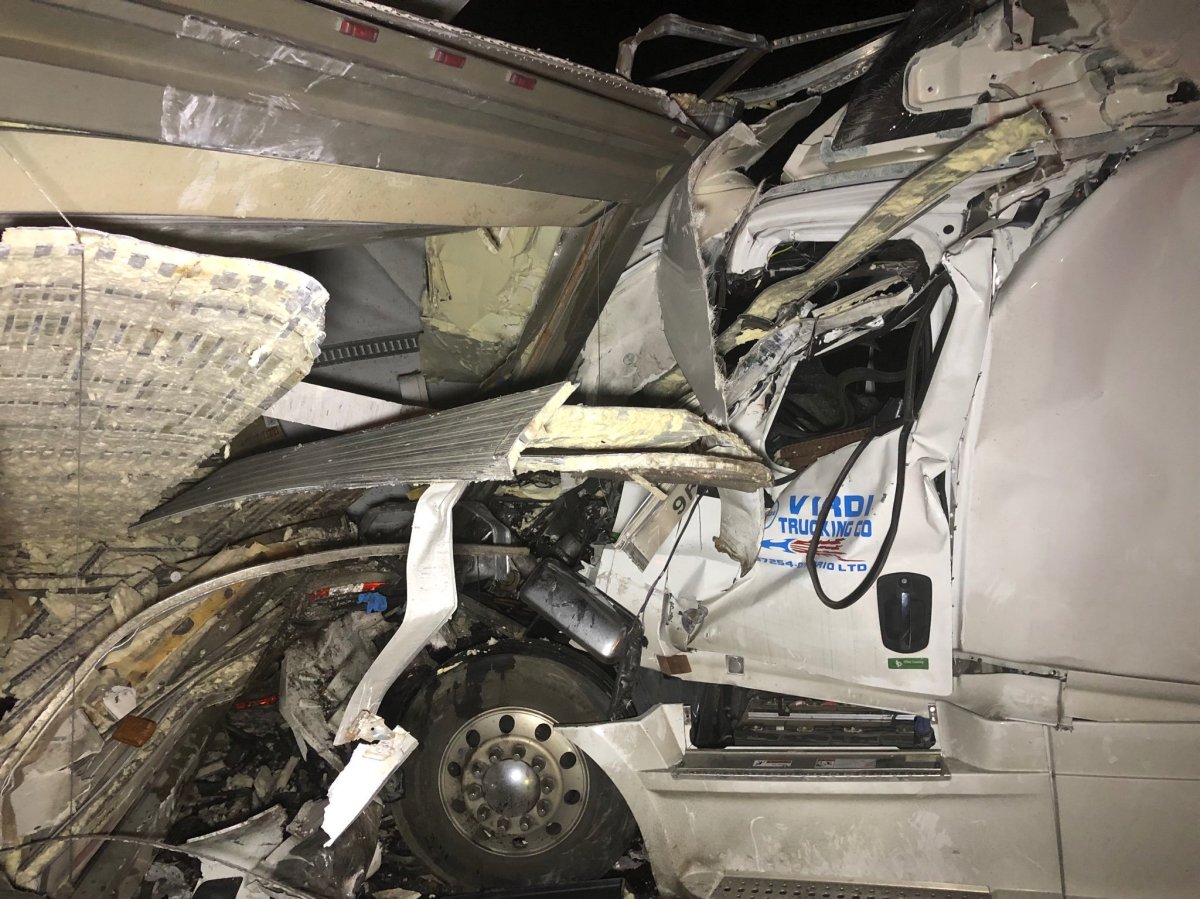 Two people were taken to hospital after three transport trucks collided on Highway 401 near Brighton early Friday.