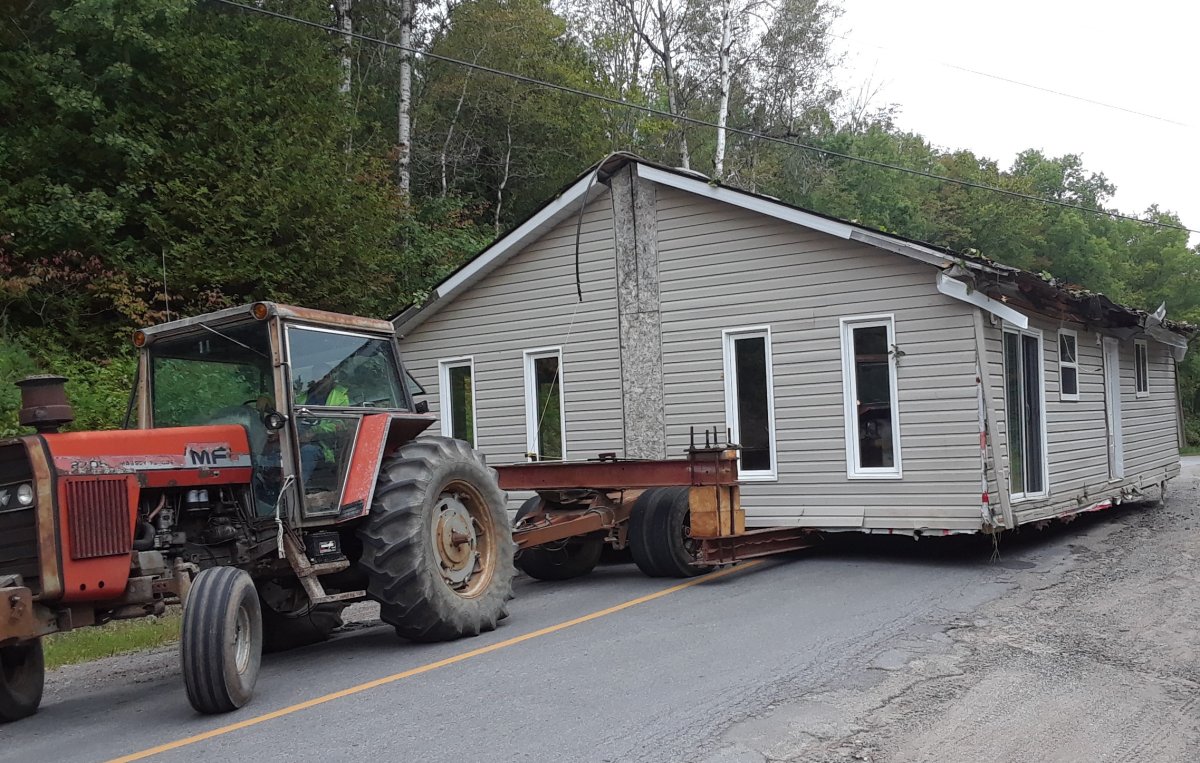 OPP have charged a Tweed man for allegedly towing a home down a road without a licence and without proper permits.