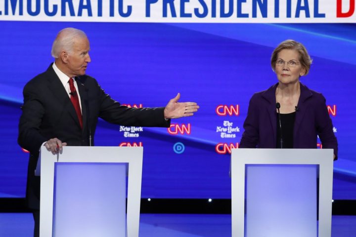 Democratic presidential candidate former Vice President Joe Biden, gestures toward Sen. Elizabeth Warren, D-Mass., during a Democratic presidential primary debate hosted by CNN/New York Times at Otterbein University, Tuesday, Oct. 15, 2019, in Westerville, Ohio. 