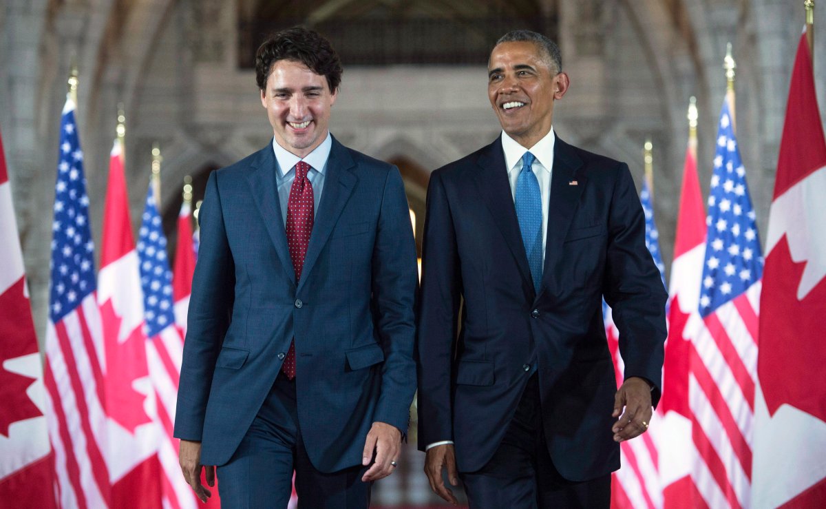 U.S. President Barack Obama and Prime Minister Justin Trudeau walk down the Hall of Honour on Parliament Hill Wednesday, June 29, 2016 in Ottawa. 