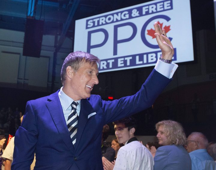 Maxime Bernier, leader of the People's Party of Canada, waves to supporters at the launch of his campaign, Sunday, August 25, 2019 in Sainte-Marie Que.