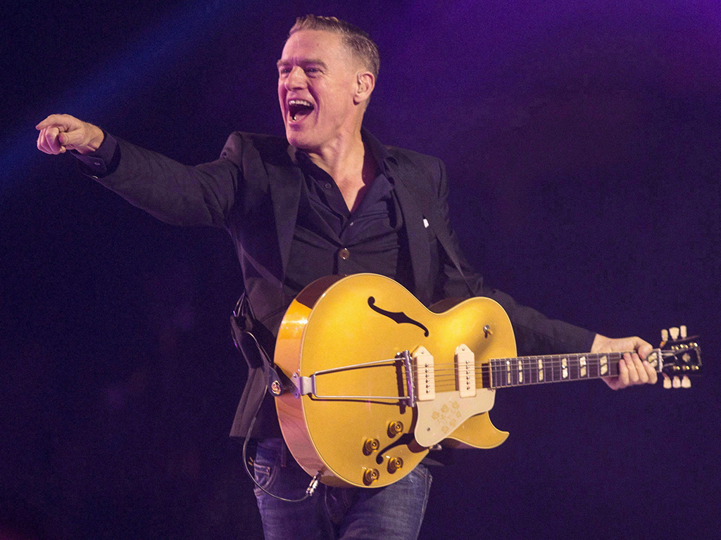 Bryan Adams performs during the Invictus Games closing ceremony in Toronto on Sept. 30, 2017. The Progressive Conservatives have turned to Adams' longtime hitmaker Jim Vallance to pen their campaign song.